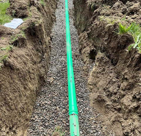 Sewer pipe installation in trench
